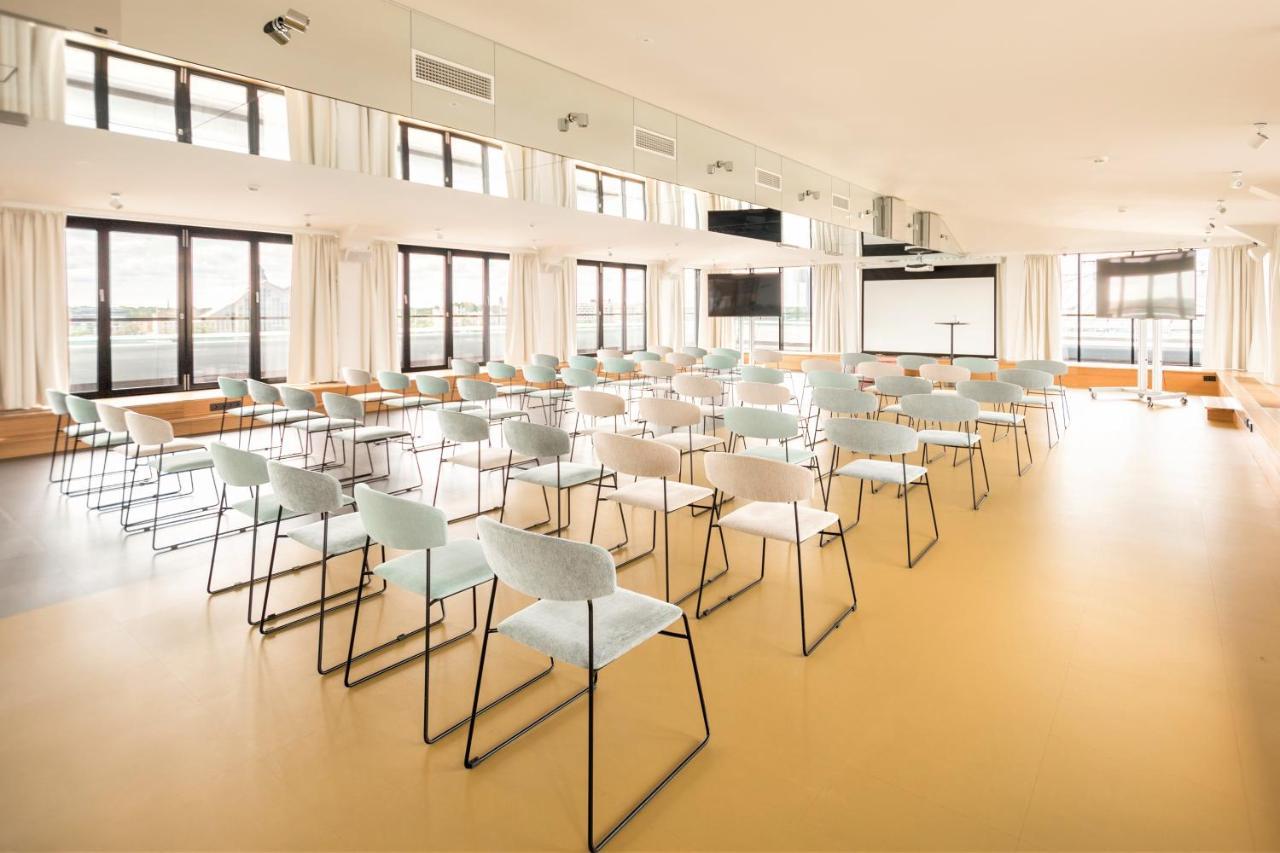 Wellton Riverside Spa Hotel Riga Bagian luar foto The interior of the venue